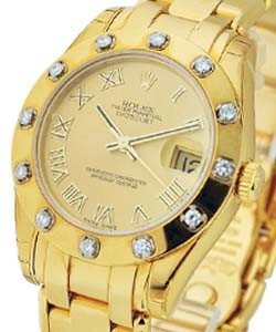 Mid Size Masterpiece with in Yellow Gold with Diamond Bezel on Yellow Gold Pearlmaster Bracelet with Champagne Roman Dial