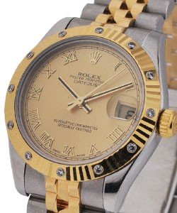 Datejust 31mm in Steel and Yellow Gold Fluted & Diamond Bezel on Jubilee Bracelet with Champagne Roman Dial