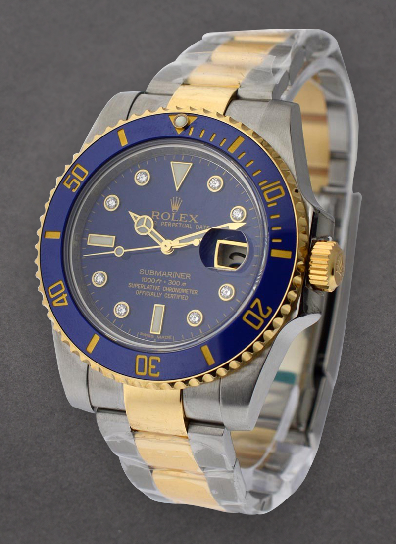 Pre-Owned Rolex Submariner 40mm in Steel with Yellow Gold Blue Ceramic Bezel