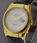 Datejust 36mm in Yellow Gold with Fluted Bezel on Strap with White Roman Dial