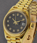 President in Yellow Gold with Fluted Bezel on Yellow Gold President Bracelet with Black Diamond Dial