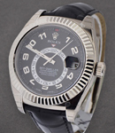 Sky Dweller 42mm in White Gold with Fluted Bezel on Strap with Black Arabic Dial