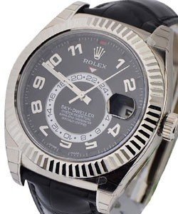 Sky Dweller 42mm in White Gold with Fluted Bezel on Strap with Black Arabic Dial