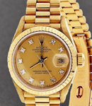 Datejust Lady's President in Yellow Gold with Fluted Bezel on President Bracelet with Champagne Diamond Dial 