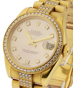 Midsize 31mm President in Yellow Gold with Diamond Bezel on Diamond Bracelet with Champagne Diamond Dial