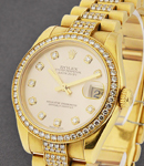 Midsize 31mm President in Yellow Gold with Diamond Bezel on Diamond Bracelet with Champagne Diamond Dial