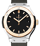 Classic Fusion 33mm Quartz in Titanium with Rose Gold Bezel On Black Rubber Strap with Black Index Dial