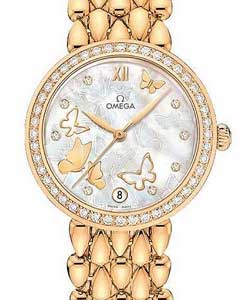 Deville Prestige Dewdrop 32.7mm Quartz in Yellow Gold with Diamond Bezel On Yellow Gold Bracelet with White Mother of Pearl Diamond Butterfly Dial