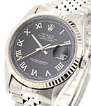 Datejust 36mm with White Gold Fluted Bezel on Jubilee Bracelet with Black Roman Dial