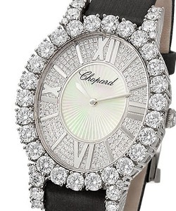 Heure Du Diamant Oval in White Gold with Diamond Case  on Black Satin Strap with Guilloche Diamond Dial 