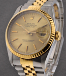 Datejust 36mm in Steel with Yellow Gold Fluted Bezel on Jubilee Bracelet with Champagne Tapeistry Stick Dial