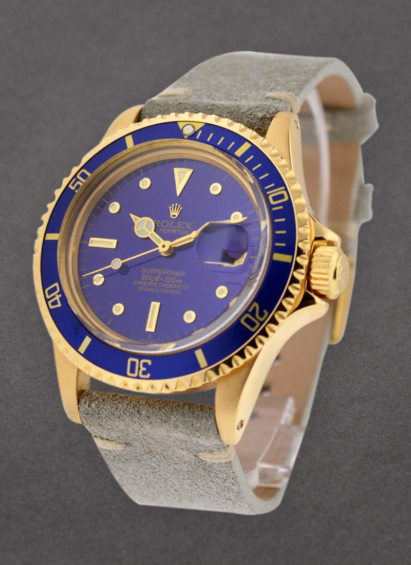 Pre-Owned Rolex Submariner in Steel with Yellow Gold With Blue Bezel