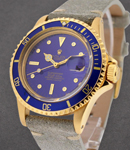 Submariner in Steel with Yellow Gold With Blue Bezel on Grey Lather Strap With Blue Dial