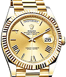 Day Date President 40mm in Yellow Gold with Fluted Bezel on President Bracelet with Champagne Roman Dial