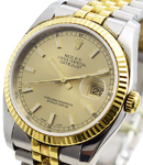 Datejust 36mm in Steel with Yellow Gold Fluted Bezel on Jubilee Bracelet with Champagne Dial Luminous Markers