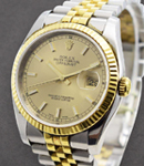 Datejust 36mm in Steel with Yellow Gold Fluted Bezel on Jubilee Bracelet with Champagne Dial Luminous Markers