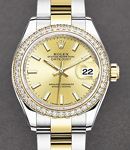 Rolex Datejust 28mm in Yellow Gold with Diamond Bezel on Oyster Bracelet with Champagne Stick Dial