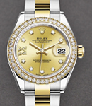 Datejust 28mm in Yellow Gold with Diamond Bezel on Oyster Bracelet with Champagne Star Diamond Dial