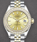 Datejust 28mm in Yellow Gold with Diamond Bezel on Jubilee Bracelet with Champagne Stick Dial