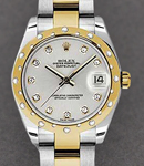 Datejust 31mm in Steel with Yellow God Domed Bezel on 2-Tone Oyster Bracelet with Silver Diamond Dial