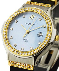 Classic Lady's 2-Tone with Diamond Lugs and Bezel on Rubber Strap with Blue MOP Diamond Dial