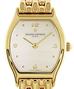 Les Esentielles Tonneau in Yellow Gold on Yellow Gold Bracelet with White Dial