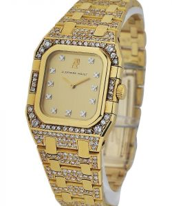 Classique  in Yellow Gold with Diamond Bezel on Yellow Gold Diamond Bracelet with Champagne Diamond Dial