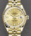 Lady-Datejust 28mm in Yellow Gold with Fluted Bezel on Jubilee Bracelet with Champagne Diamond Dial