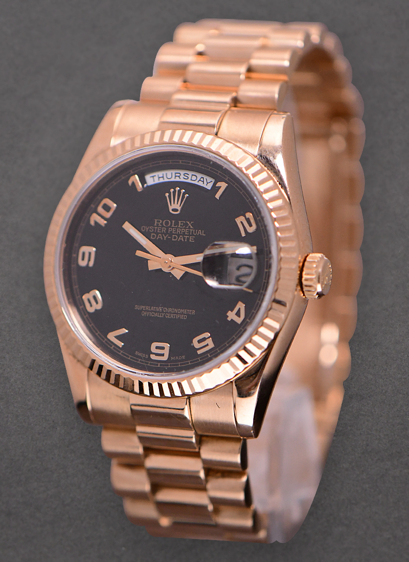 Pre-Owned Rolex President Day Date in Rose Gold with Fluted Bezel on President Bracelet with Black Arabic Dial