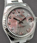 Datejust in Steel with Fluted Bezel on Steel Oyster Bracelet with Goldust Mother of Pearl Diamond Dial