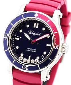 Happy Sport Round in Steel on Pink Articulated Rubber Strap with Blue with Five Floating Diamonds Dial