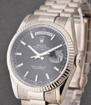 President 36mm in White Gold with Fluted Bezel on President Bracelet with Black Stick Dial