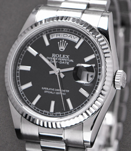 President 36mm in White Gold with Fluted Bezel on President Bracelet with Black Stick Dial