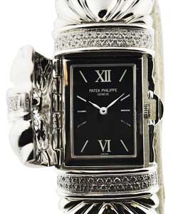 Lady's Concealed in White Gold with Diamond Bezel on White Gold Bracelet with Black Dial