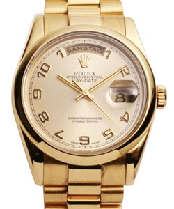 Day-Date President in Yellow Gold Domed Bezel on President Bracelet with Champagne Arabic Dial