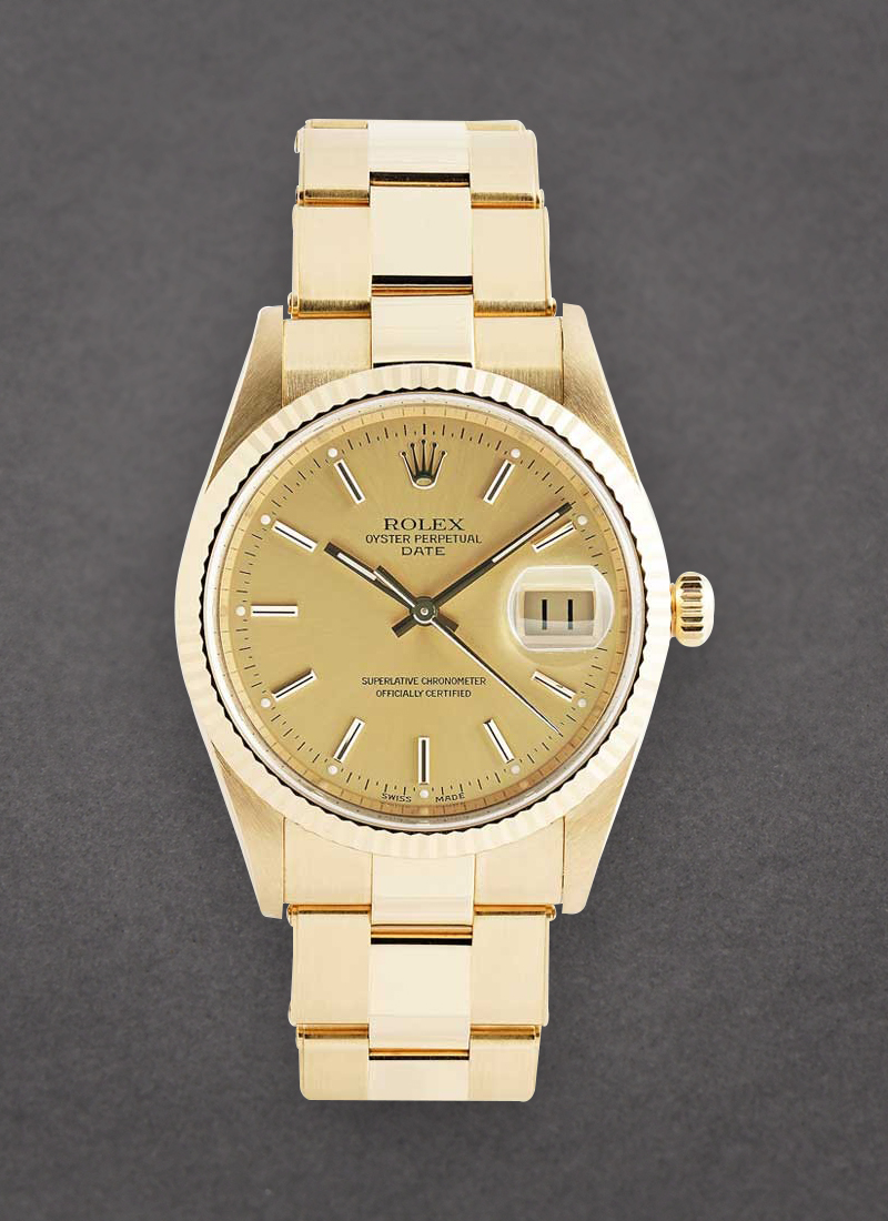 Pre-Owned Rolex Date 34mm in Yellow Gold with Fluted Bezel