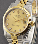 Datejust Mid Size in Steel and Yellow Gold Fluted Bezel on Jubilee Bracelet with Champagne Diamond Dial