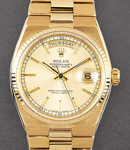 Day-Date President 36mm in Yellow Gold  on Oyster Quartz Bracelet with Champagne Tapestry Index Dial