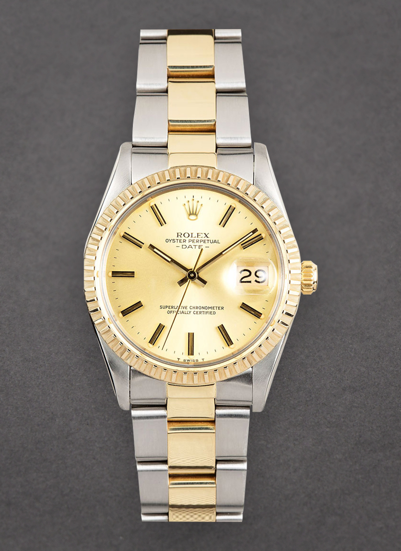 Pre-Owned Rolex Date 34mm in Steel with Yellow Gold Fluted Bezel