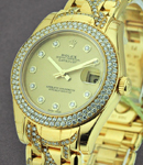 Masterpiece 34mm Midsize in Yellow Gold with 2-Row Diamond Bezel on Pearlmaster Diamond Bracelet with Champagne Diamond Dial