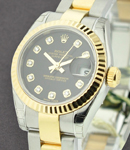 Datejust Lady's 26mm in Steel with Yellow Gold Fluted Bezel on Steel and Yellow Gold Oyster Bracelet with Black Diamond Dial