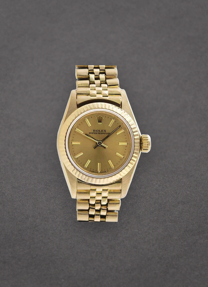 Pre-Owned Rolex Oyster Perpetual No Date Lady's in Yellow Gold with Fluted Bezel