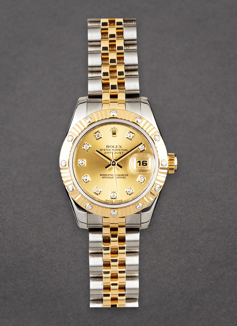 Pre-Owned Rolex Datejust Lady's in Steel with Yellow Gold Fluted 12 Diamond Bezel