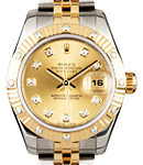Datejust Lady's in Steel with Yellow Gold Fluted 12 Diamond Bezel on Jubilee Bracelet with Champagne Diamond Dial