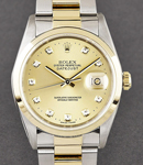 Datejust 36mm in Steel with Yellow Gold Smooth Bezel on Oyster Bracelet with Champagne Diamond Dial