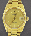 Datejust 31mm in Yellow Gold with Fluted Bezel on President Bracelet with Champagne Stick Dial