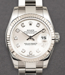 Datejust Oyster Perpetual 26mm in Steel with White Gold Fluted Bezel on Steel Oyster Bracelet with Silver Diamond Dial