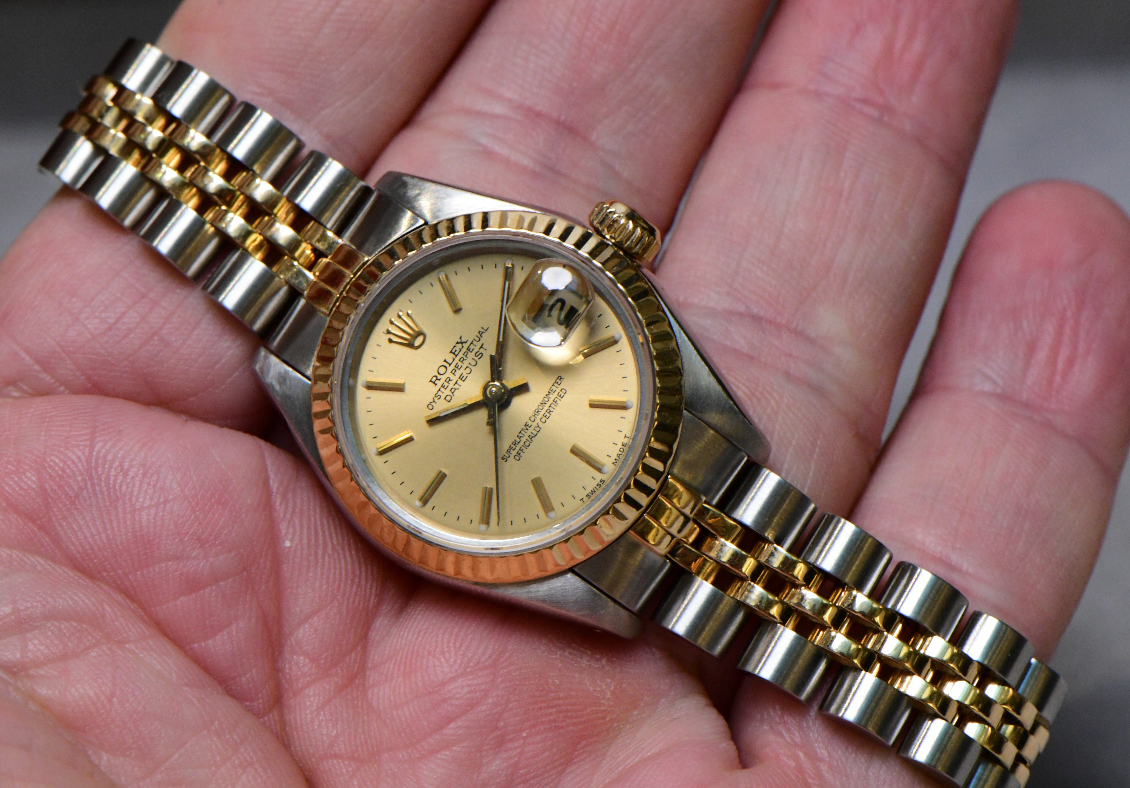 Pre-Owned Rolex Datejust Ladys in Steel with Yellow Gold Fluted Bezel on Steel and Yellow Gold Jubilee Bracelet with Champagne Stick Dial