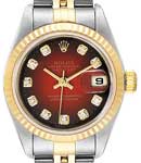 Datejust 26mm in Steel with Yellow Gold Fluted Bezel on Jubilee Bracelet with Red Vignetter Diamond Dial