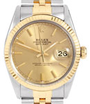 Datejust 36mm in Steel with Yellow Gold Fluted Bezel on Jubilee Bracelet with Champagne Stick Dial
